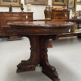 Antique French Oak renaissance style round centre table. Featuring amazing detailed carving to base and throughout. Sourced from France and in good original detailed condition.