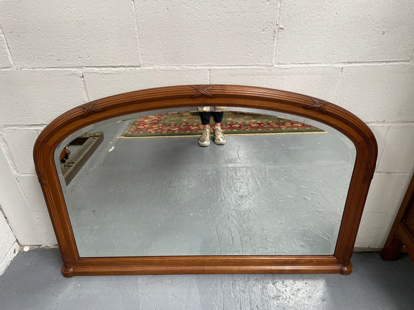 French walnut Art Deco style mantle mirror. Beautiful decorative carvings and still has its original bevelled edge mirror. Sourced directly from France and in good original condition with mirror showing some age. 