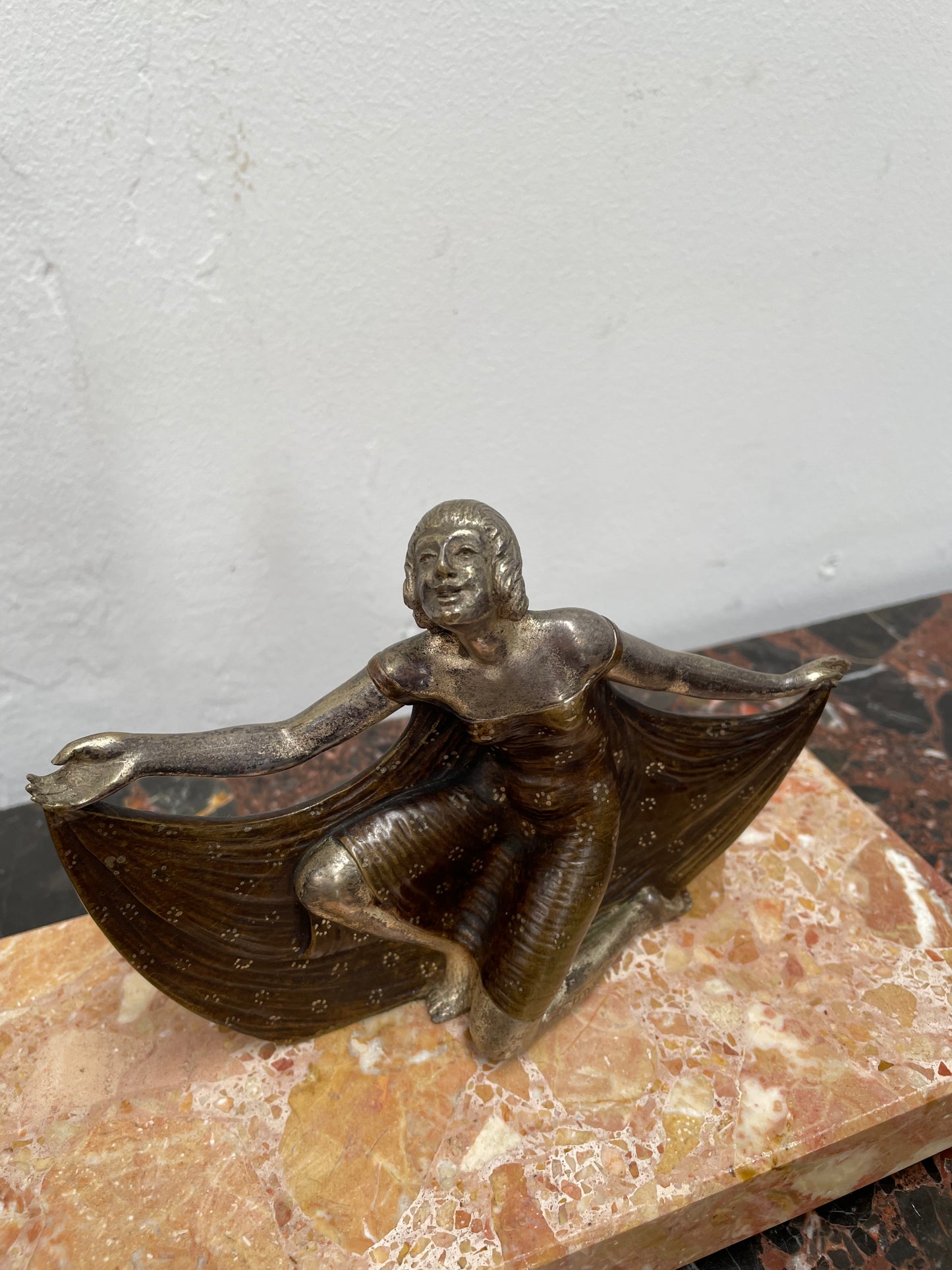 Stunning signed Art Deco bronze and silver plated figure on a marble base. It is in good original condition and has been imported directly from France.