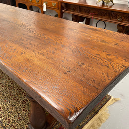 Solid charming rustic French farmhouse table with a stretcher base and turned legs. Imported directly from France and is circa 1930's. In good original detailed condition.