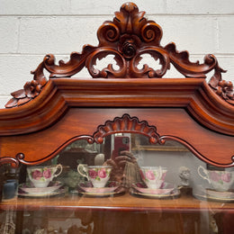Outstanding French Mahogany sideboard of good small proportions. It has a lovely display area at the top and hidden storage at the bottom. In good restored condition. Circa 1860.