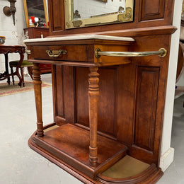 Outstanding quality custom made vintage French style hallstand. It features four decorative hanging hooks, a practical white marble top and a drawer for added storage. In good original condition and has been sourced locally.