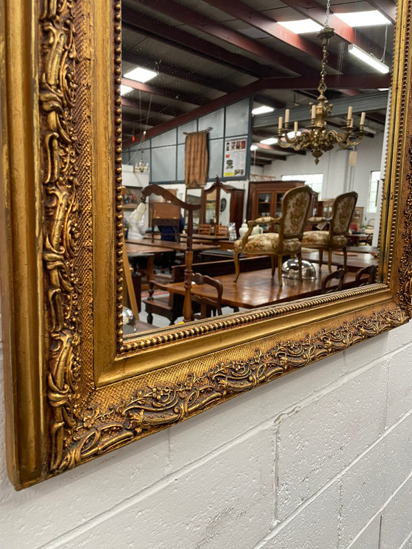 Stunning French 19th Century Louis XV style gilt wall mirror. Lovely ornate details and has its original mirror. In good original detailed condition and has been sourced directly from France. 