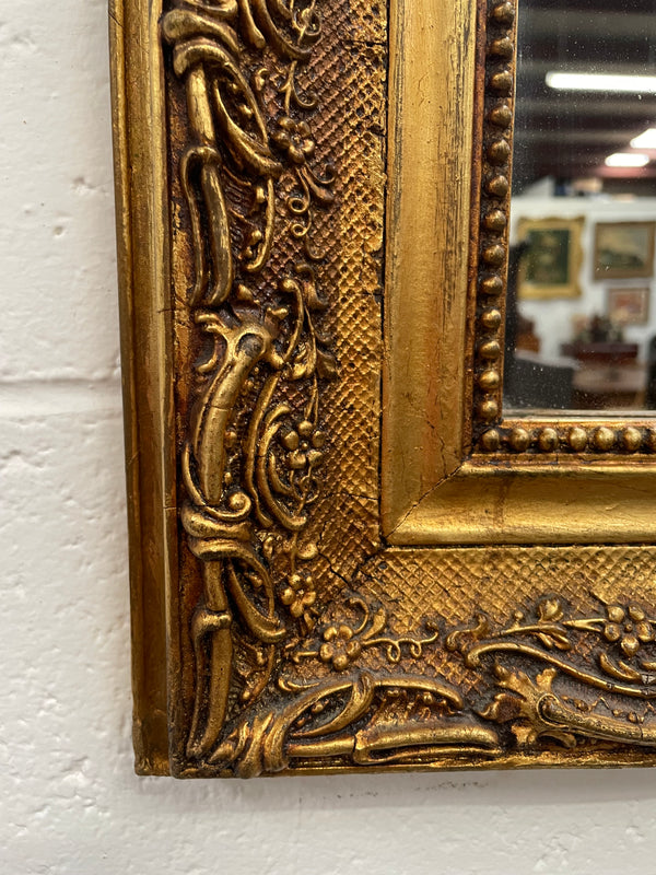 Stunning French 19th Century Louis XV style gilt wall mirror. Lovely ornate details and has its original mirror. In good original detailed condition and has been sourced directly from France. 