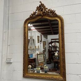 Stunning French 19th Century Louis XV style gilt wall mirror. Lovely ornate details and has its original mirror. In good original detailed condition and has been sourced directly from France. 