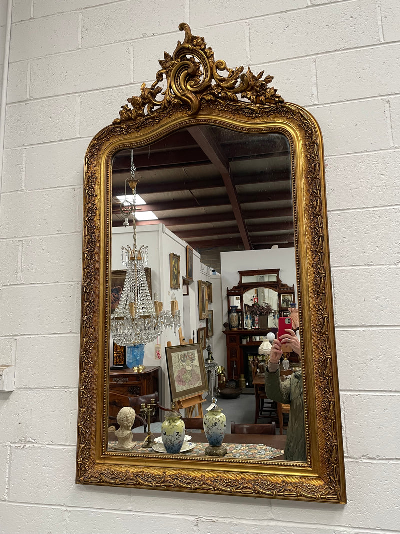 Stunning French 19th Century Louis XV style gilt wall mirror. Lovely ornate details and has its original mirror. In good original detailed condition and has been sourced directly from France. 