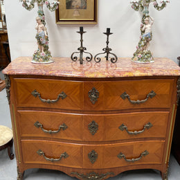 Appealing French Louis XIV style three drawer inlaid marble top commode. It has a stunning marble top and attractive ormolu trims. In good original detailed condition.