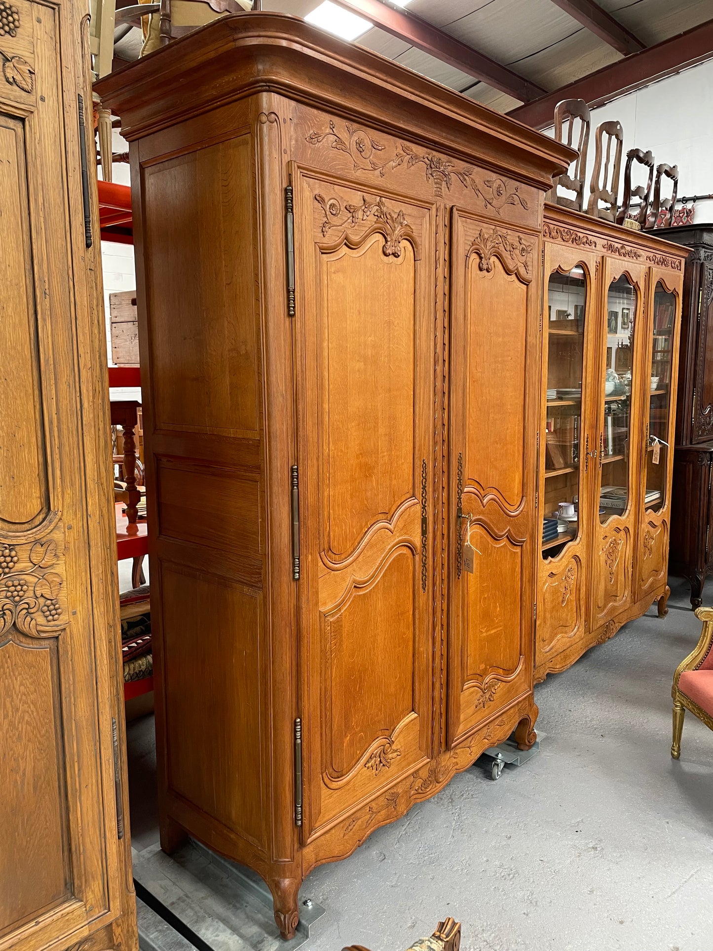 This attractive two door armoire has full hanging space. It is a pleasing piece with fine decorative carvings on the doors and is known as a marriage armoire. Imported directly from France and is in good original detailed condition.