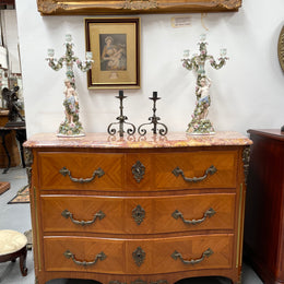 Appealing French Louis XIV style three drawer inlaid marble top commode. It has a stunning marble top and attractive ormolu trims. In good original detailed condition.