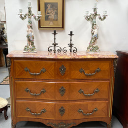 Appealing French Louis XIV style three drawer inlaid marble top commode. It has a stunning marble top and attractive ormolu trims. In good original detailed condition.