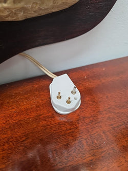 Original older three-round-pin electrical plug fitted to vintage Holy Family wall plaque