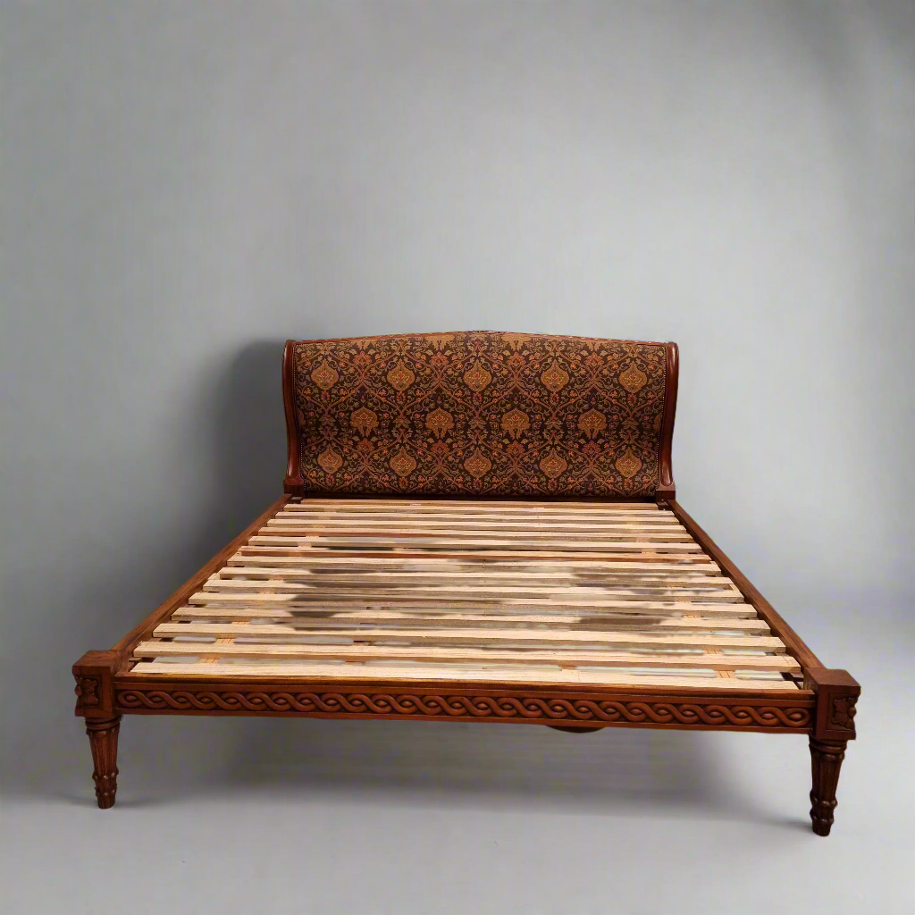 Vintage Empire style hard to find king Size bed with impressive tapestry upholstery. It comes with custom made bed slats ready to simple place your standard king size mattress on top. It is in good original detailed condition. The tapestry upholstery is in good condition and is upholstered on the back as well.