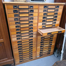 Forty-drawer specimen collector’s cabinet with a removable glazed drawer open
