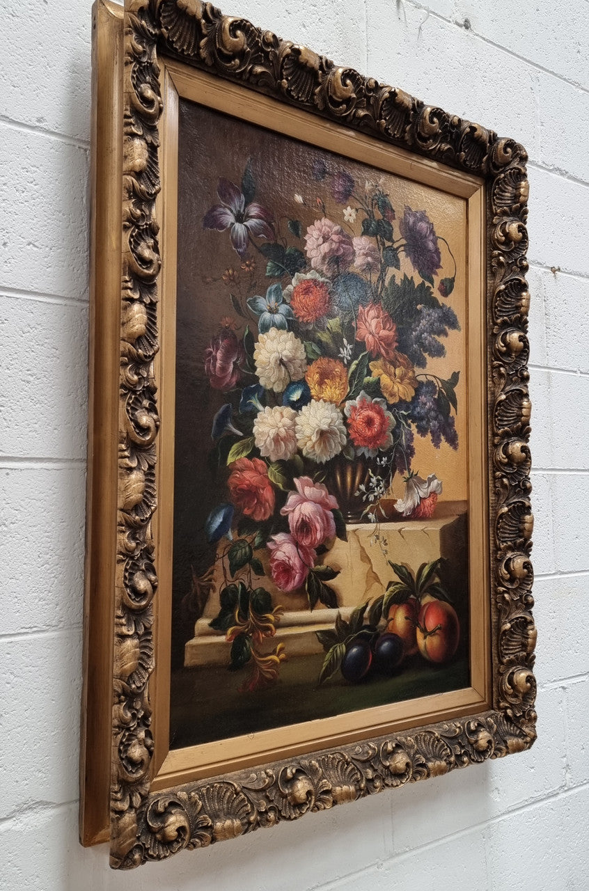 Restored 18th Century Flemish / Dutch framed still life oil painting of a bouquet of flowers. It is framed in a decorative gold frame and is signed. Such a stunning painting.