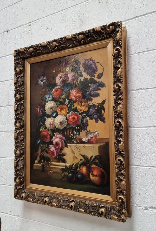 Restored 18th Century Flemish / Dutch framed still life oil painting of a bouquet of flowers. It is framed in a decorative gold frame and is signed. Such a stunning painting.