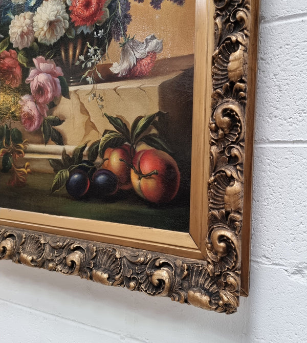 Restored 18th Century Flemish / Dutch framed still life oil painting of a bouquet of flowers. It is framed in a decorative gold frame and is signed. Such a stunning painting.