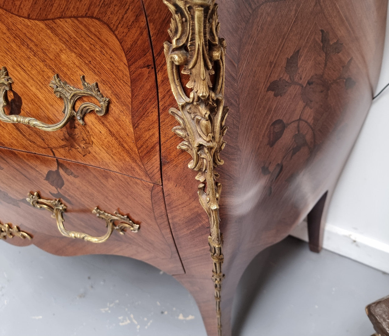 Louis XV style marquetry inlay marble top two drawer commode. It has decorative ormolu mounts and beautiful marble top. In good original detailed condition and has been sourced from France.