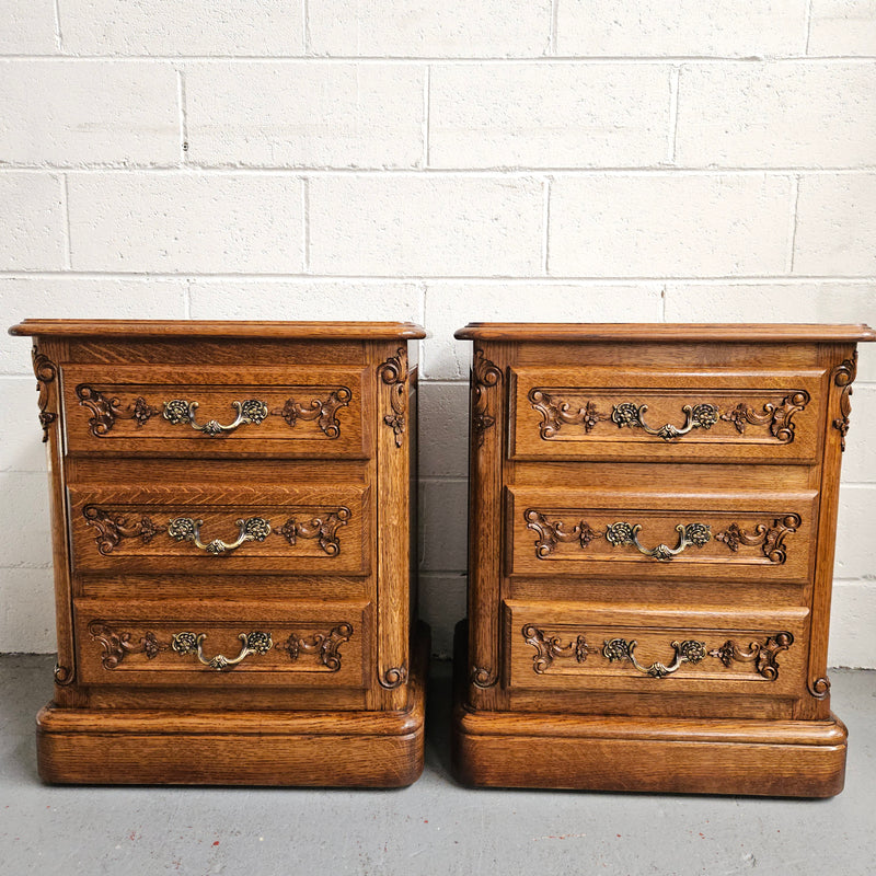 Hard to find Louis XVI style French Oak bedsides with three drawers and lovely carvings. They are in good original detailed condition. 