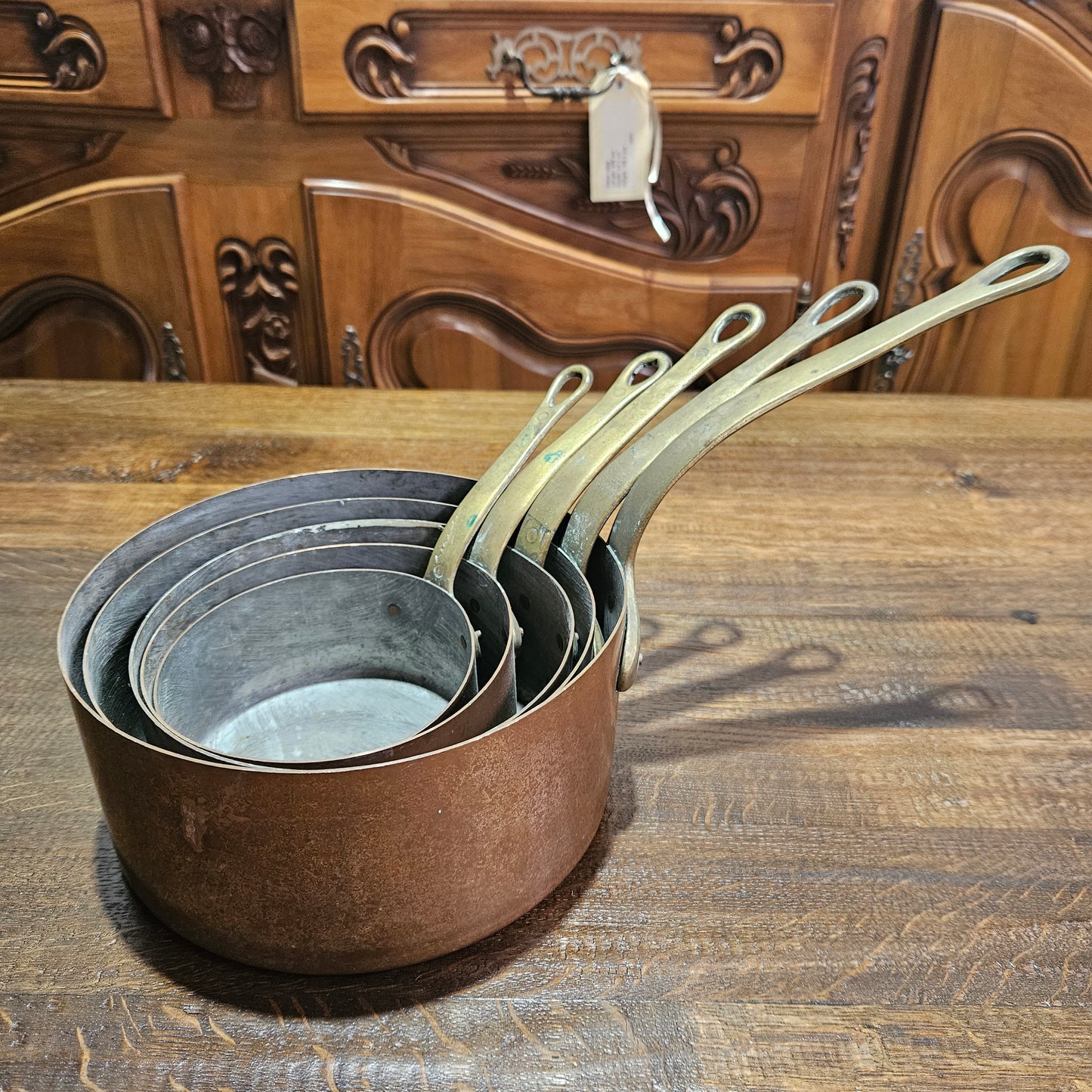 Lovely set of five copper sauce pots, they are all in good original condition for the age. Sourced from France. 