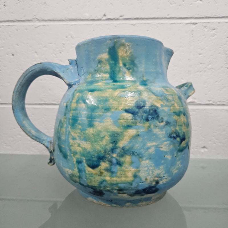 Superb Vintage rustic hand made jug, it has two handles and a spout. It is in good original condition. Please see photos as they form part of the description.