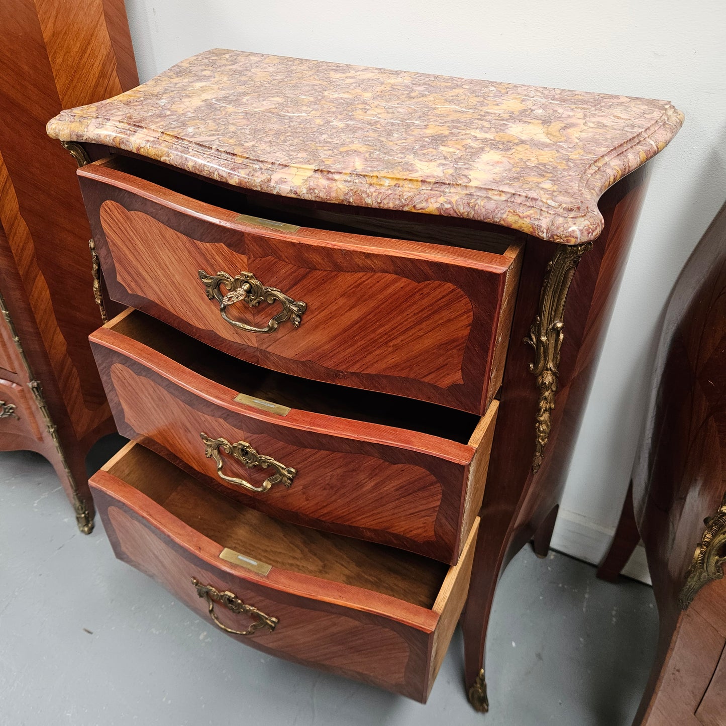 Attractive  Louis XVth Style Marble Top Commode of Medium Proportions.