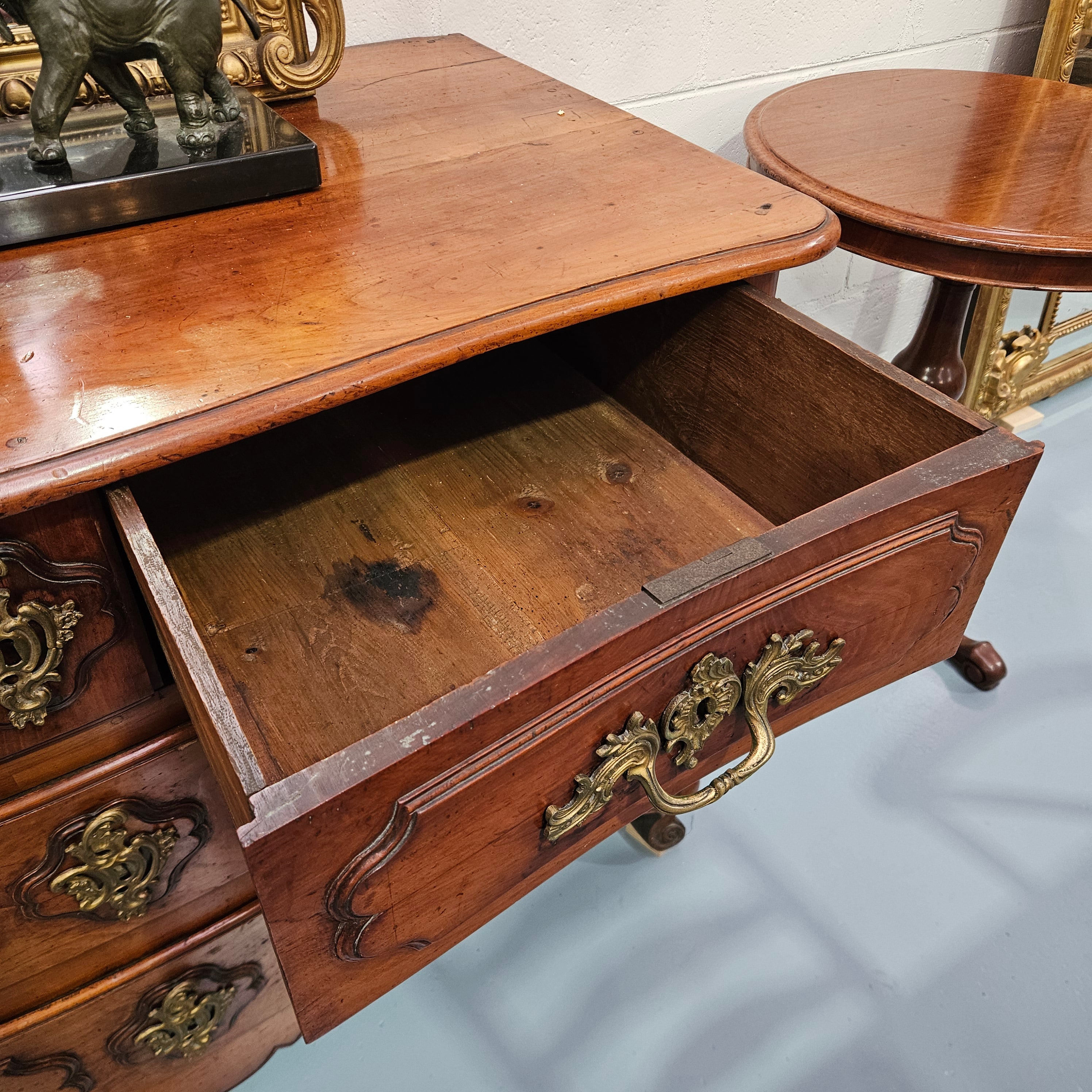 Fruitwood commode — second upper drawer open