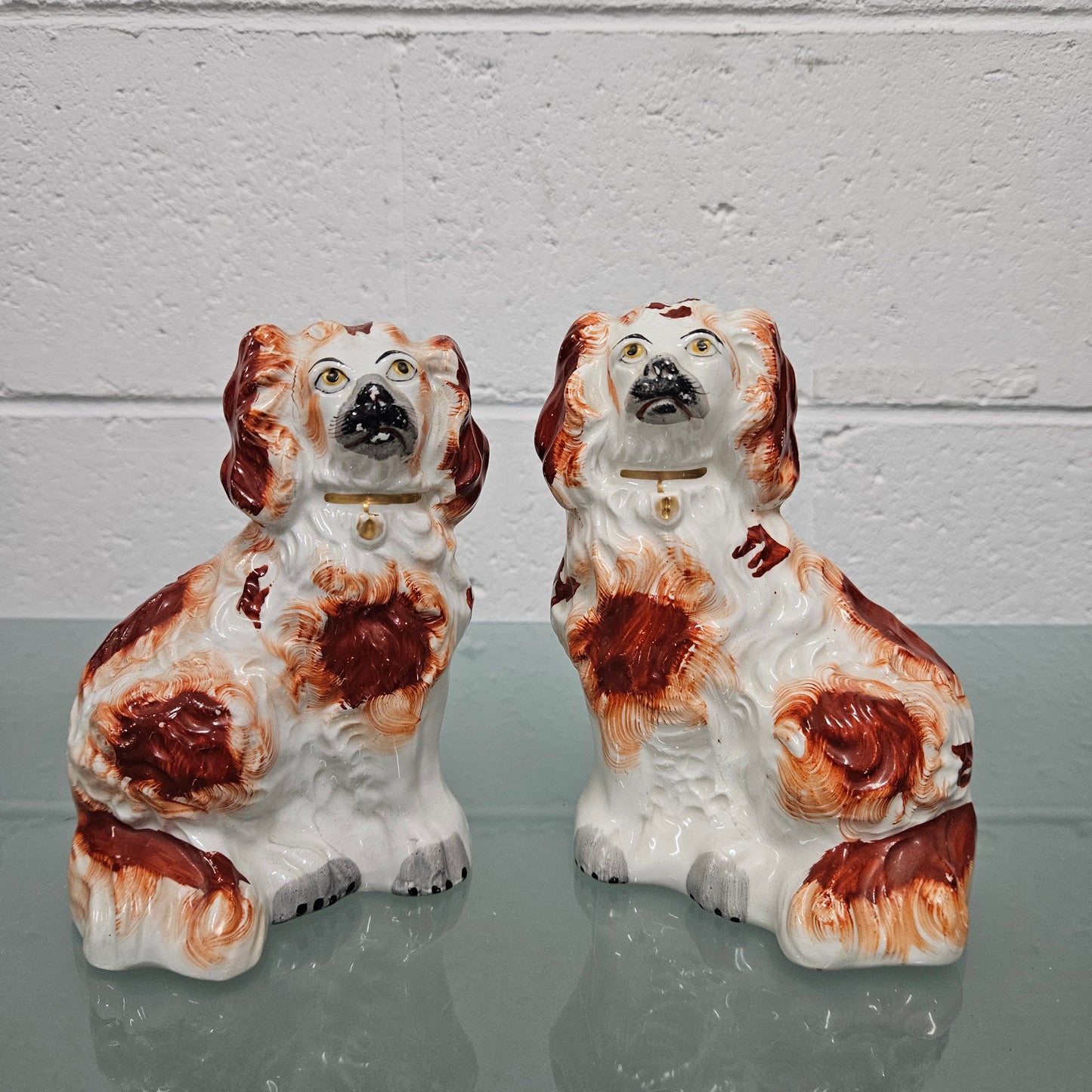 Pair of Antique Staffordshire Spaniels Statues