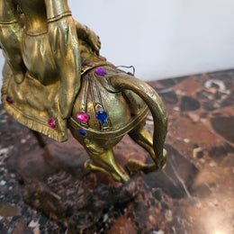 Victorian gilt bronze jeweled lady rider horse on a naturalistic wooden base. Circa 1890 and has a Hidden Compartment.