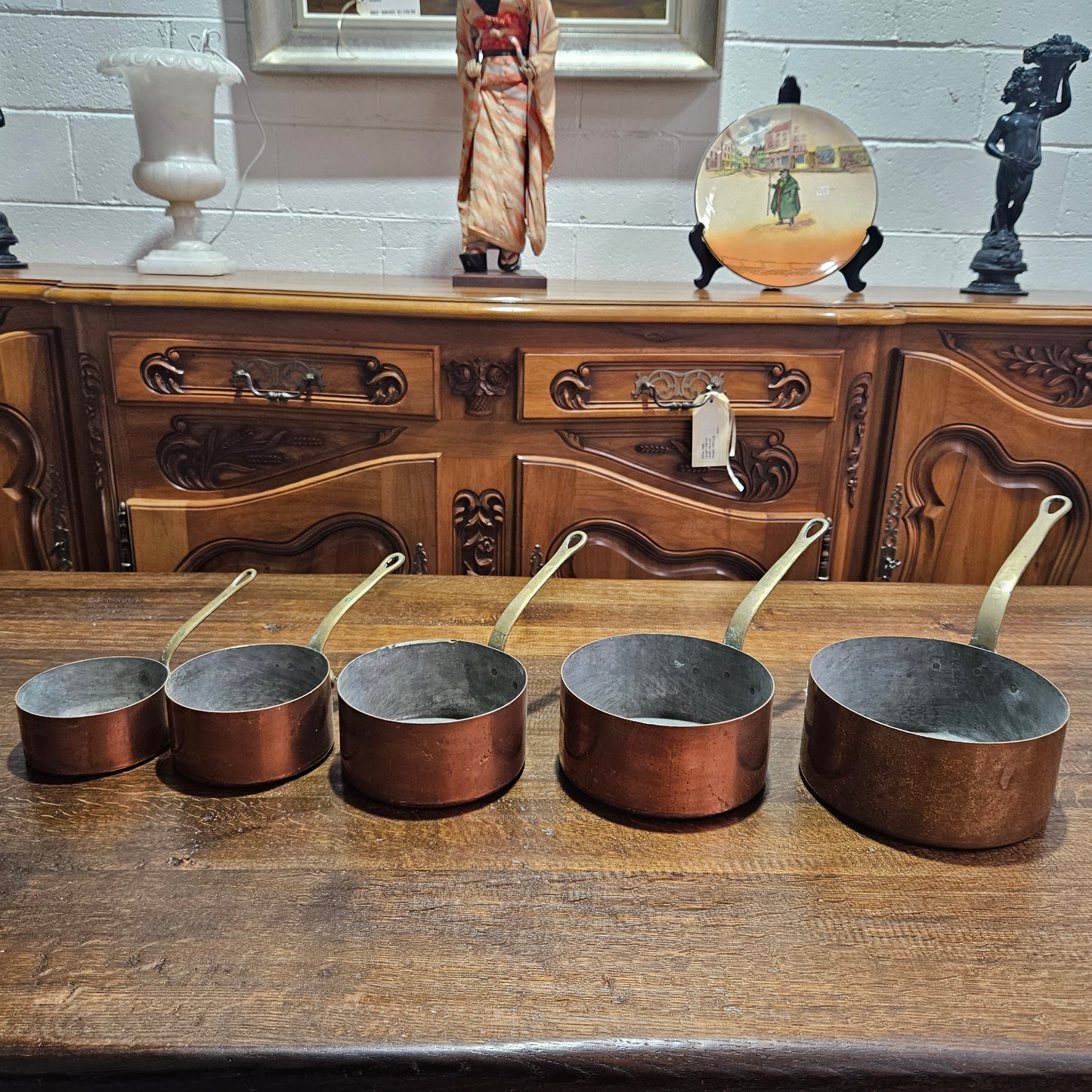 Lovely set of five copper sauce pots, they are all in good original condition for the age. Sourced from France. 