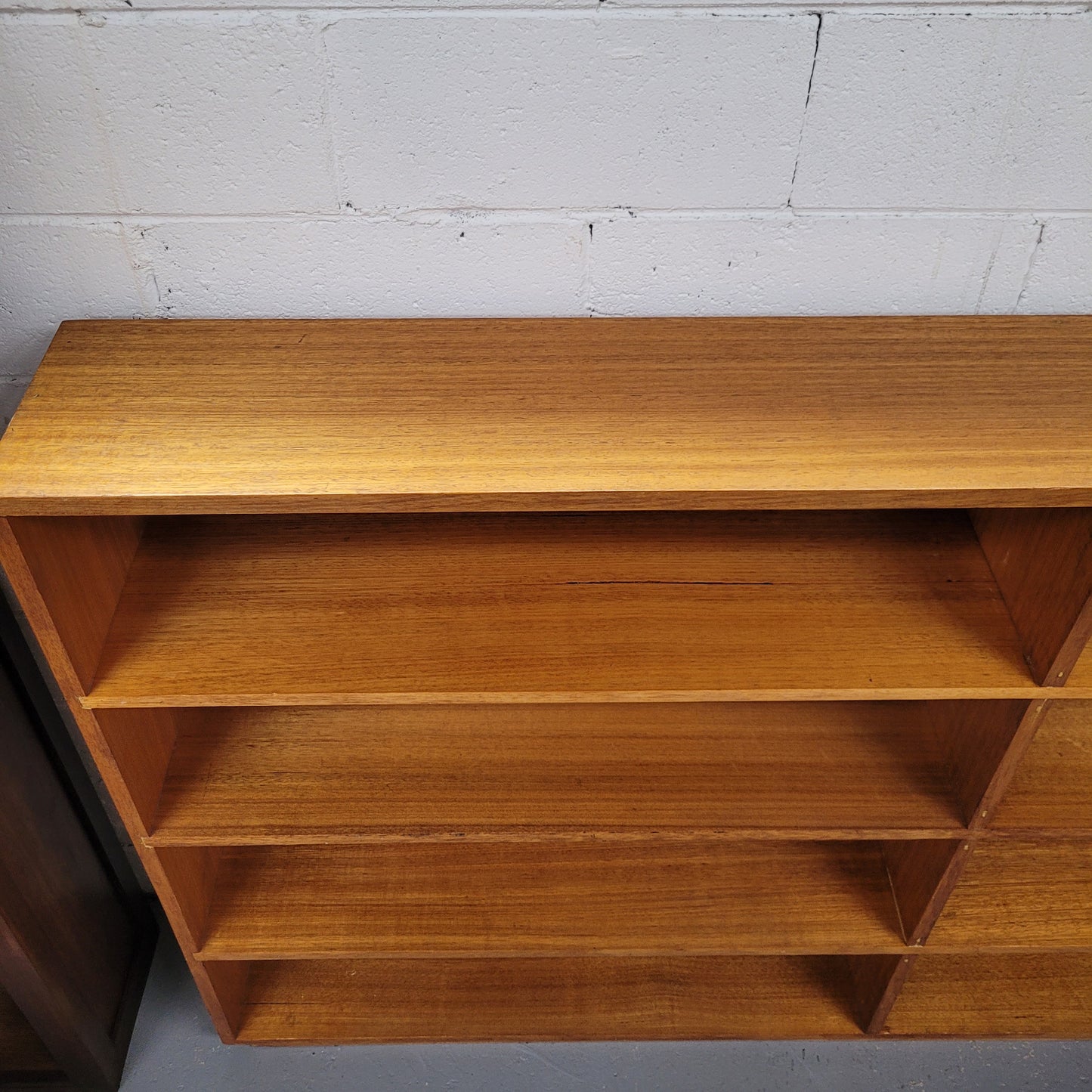 Australian Vic Ash double open bookcase with eight fixed shelves of pleasing narrow proportions. Sourced locally and in good original condition. Please view photos as they help form part of the description and condition.