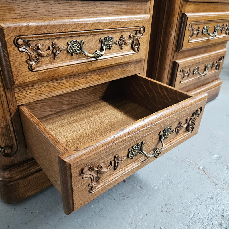 Hard to find Louis XVI style French Oak bedsides with three drawers and lovely carvings. They are in good original detailed condition. 