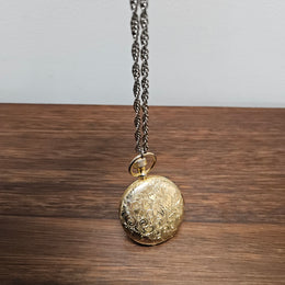 Estee Lauder Gold Tone Compact Pendant