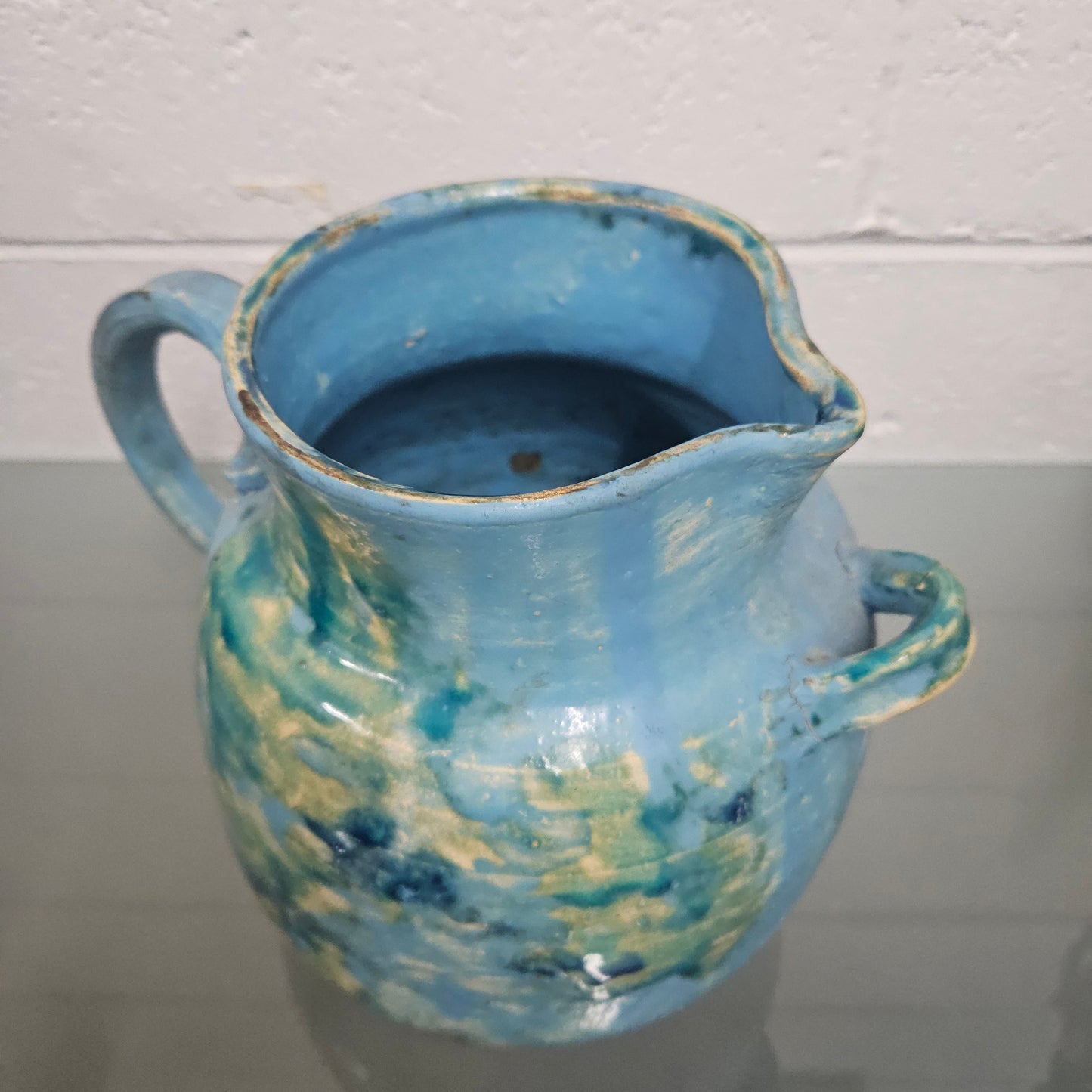 Superb Vintage rustic hand made jug, it has two handles and a spout. It is in good original condition. Please see photos as they form part of the description.