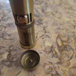 Vintage Ladies Squeeze Automatic Petrol Lighter. Advertising "Griffin Shoes".