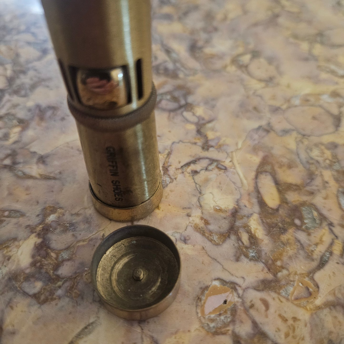 Vintage Ladies Squeeze Automatic Petrol Lighter. Advertising "Griffin Shoes".