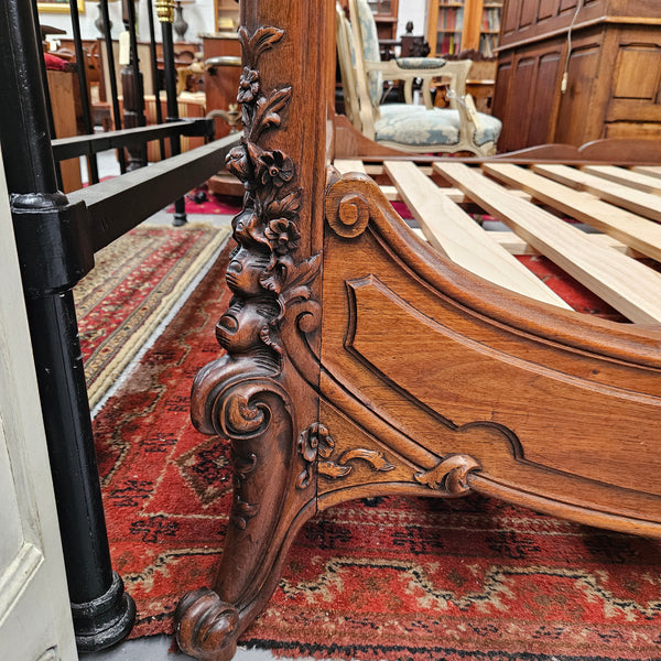 Beautifully carved Antique Louis XV style French Walnut queen size bed. Comes with custom made bed slates. Sourced from France and in good original detailed condition.