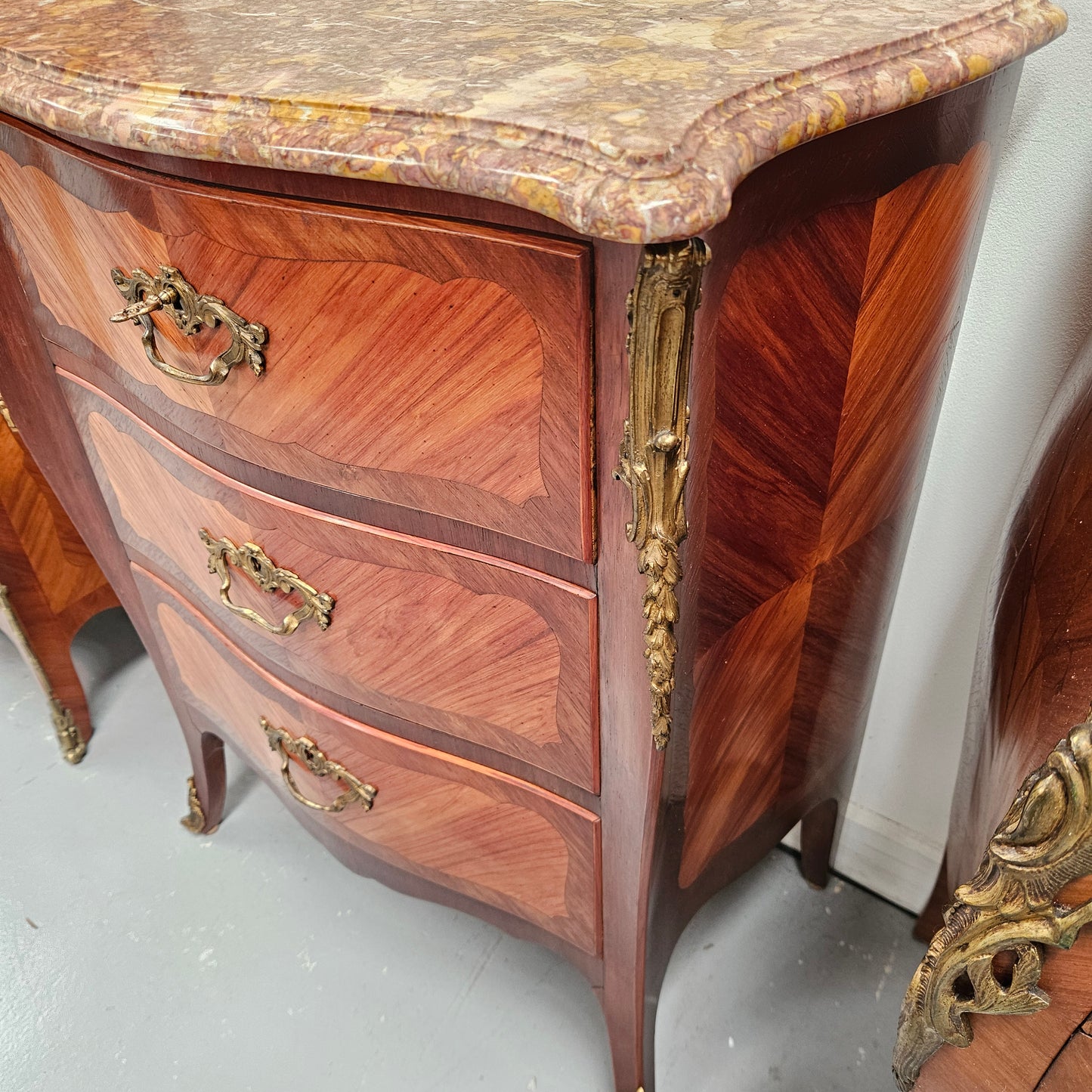 Attractive  Louis XVth Style Marble Top Commode of Medium Proportions.