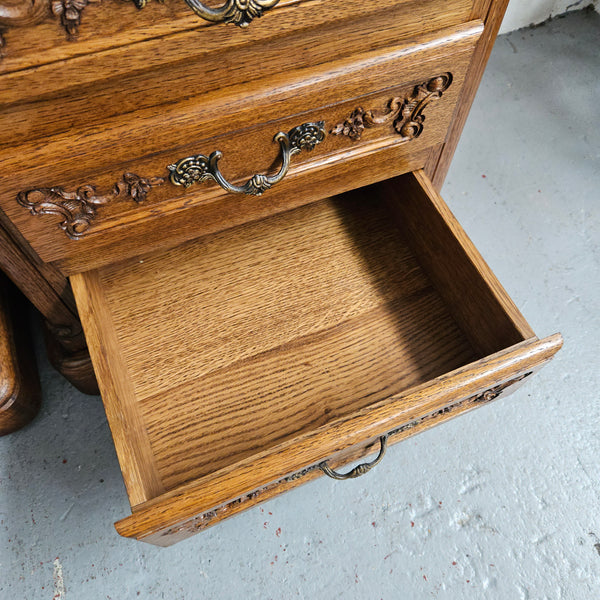 Hard to find Louis XVI style French Oak bedsides with three drawers and lovely carvings. They are in good original detailed condition. 