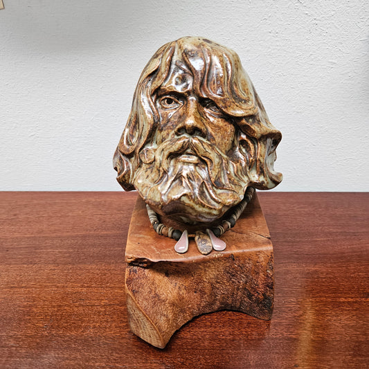 Impressive vintage pottery bust of a man on a wooden base. It is in good original condition and quite heavy. Please see photos as they form part of the description.