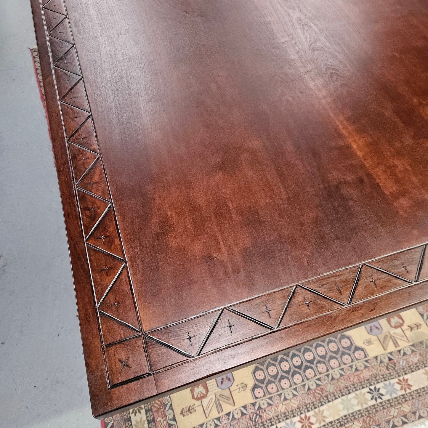 Vintage walnut Spanish style farmhouse table with a beautiful top and iron work. It is in good restored condition. Circa 1950'S.