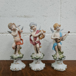 Set of Three Capodimonte Angle Figurines