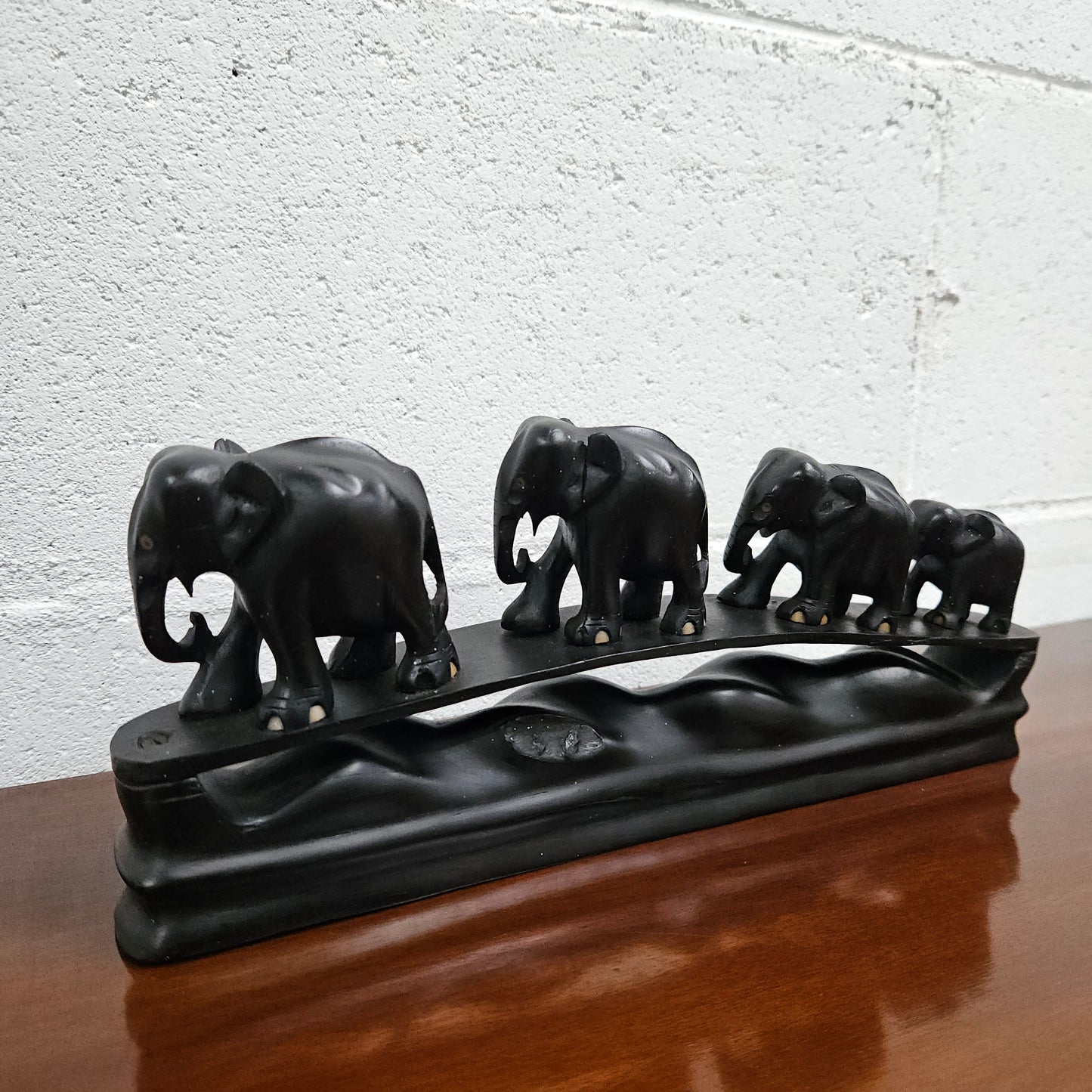 Vintage Ebony Walking Elephants Statue