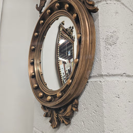 Vintage French Empire Style Gilt Convex Mirror Featuring Eagle
