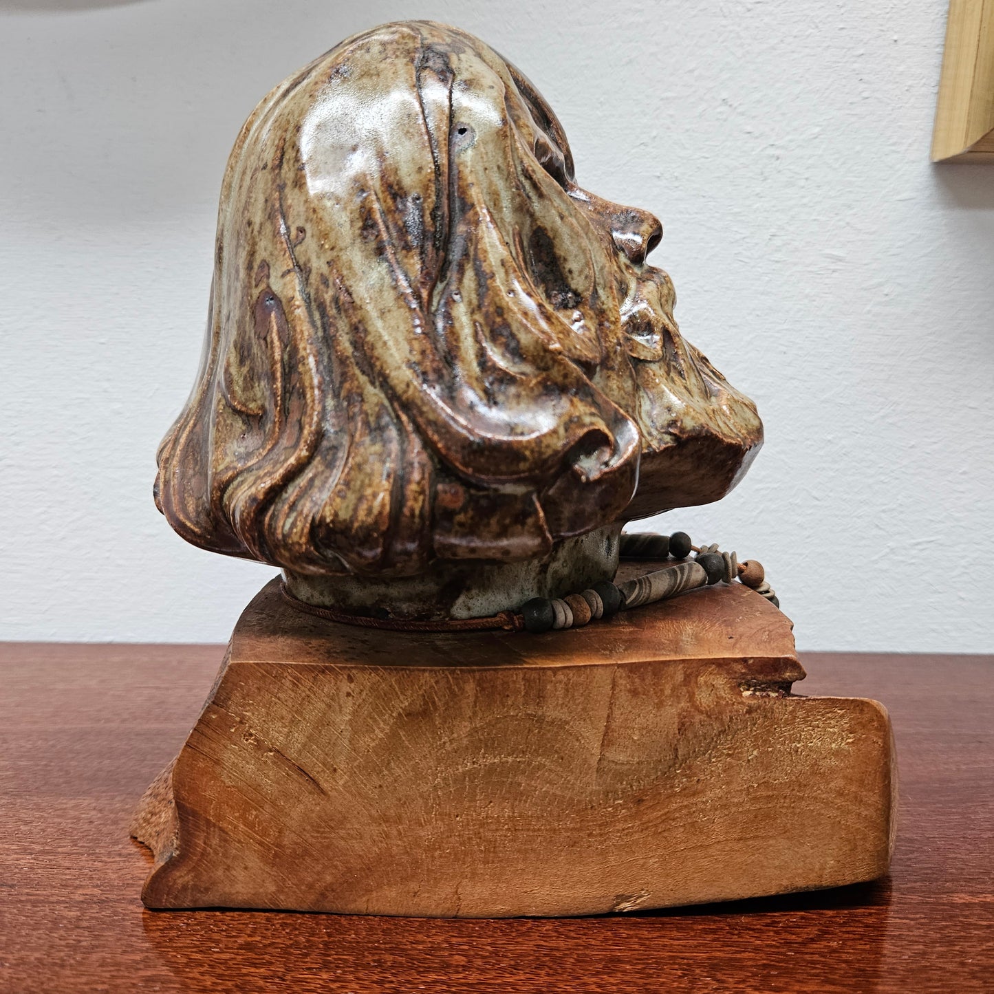 Impressive vintage pottery bust of a man on a wooden base. It is in good original condition and quite heavy. Please see photos as they form part of the description.