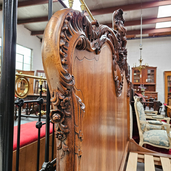 Beautifully carved Antique Louis XV style French Walnut queen size bed. Comes with custom made bed slates. Sourced from France and in good original detailed condition.