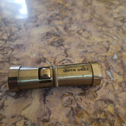 Vintage Ladies Squeeze Automatic Petrol Lighter. Advertising "Griffin Shoes".