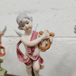 Set of Three Capodimonte Angle Figurines