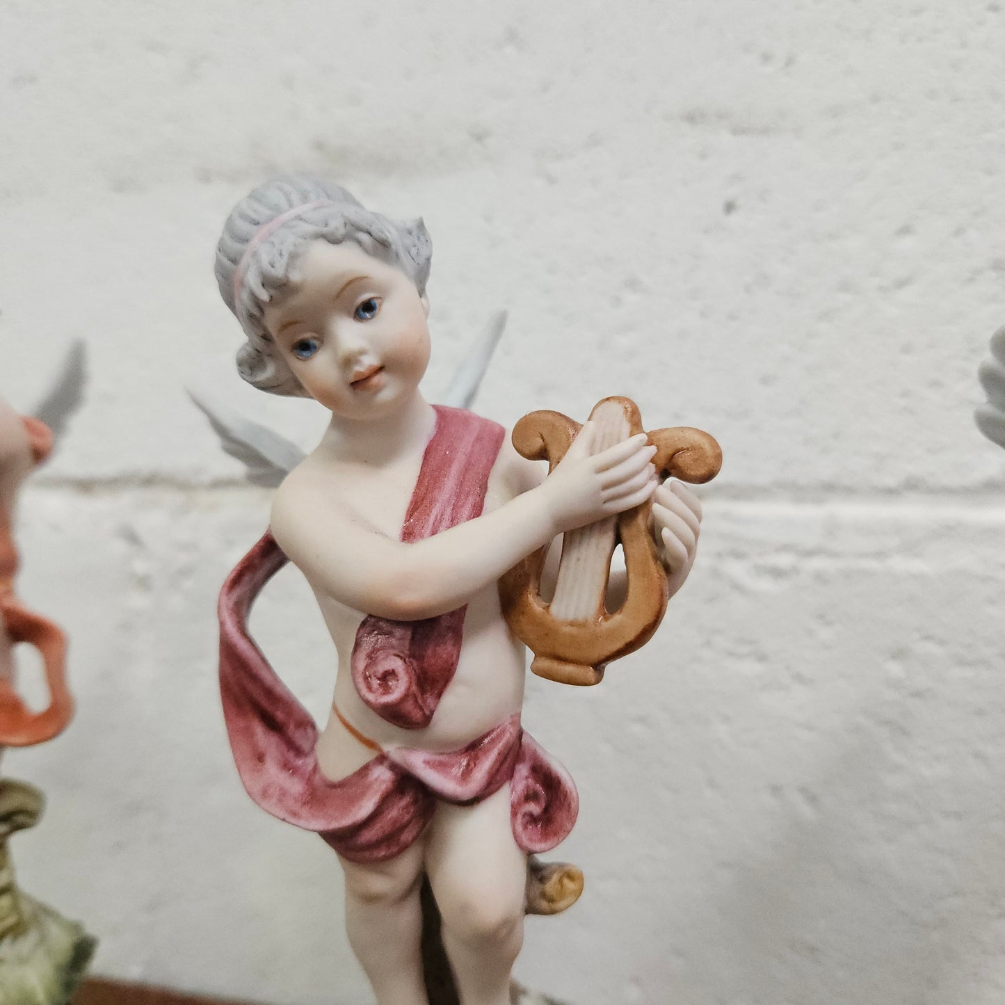 Set of Three Capodimonte Angle Figurines