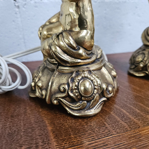 Beautiful pair of vintage gilt cherub lamps. They are both in good working order and wired to Australian standards. Please see photos as they form part of the description 