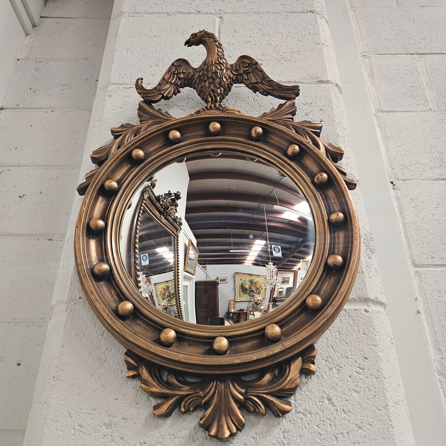 Vintage French Empire Style Gilt Convex Mirror Featuring Eagle